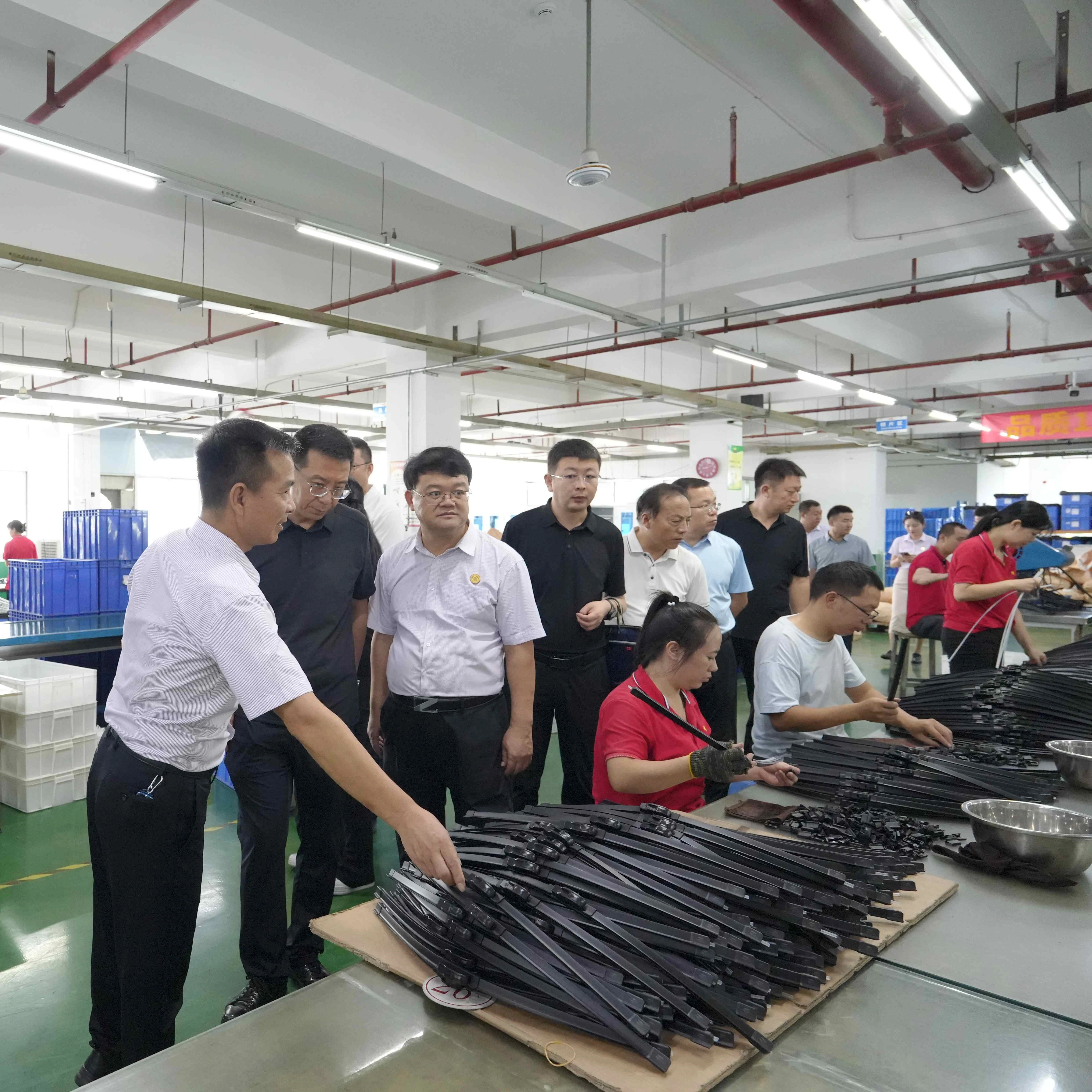 What happened when the leaders of Yan 'an City inspected the Yujin Wiper Factory?